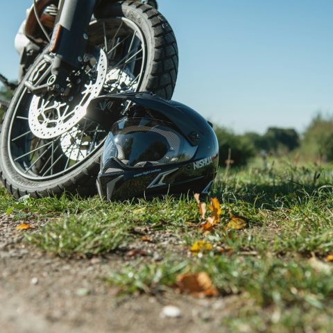 a motorcycle parked on the side of a road